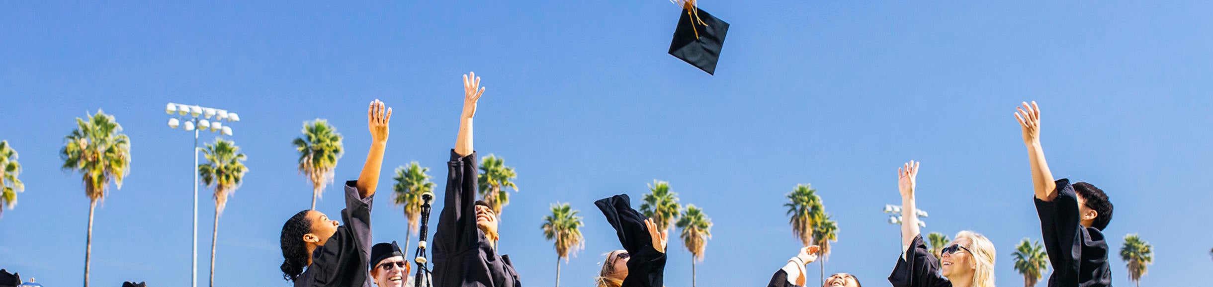 Graduation at UCR, hats flying