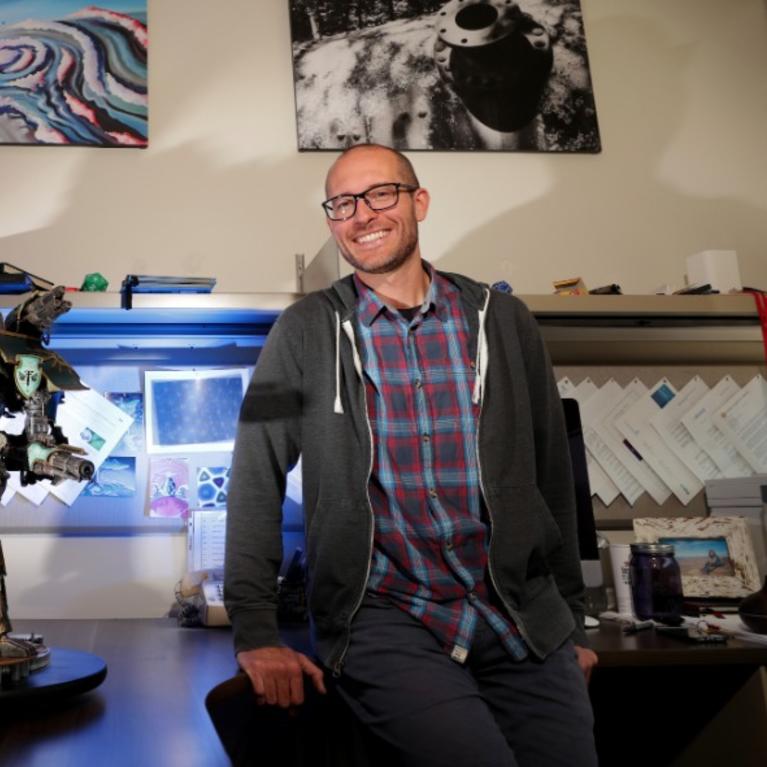 Dr. Nathaniel Gabor in his office (c) UCR