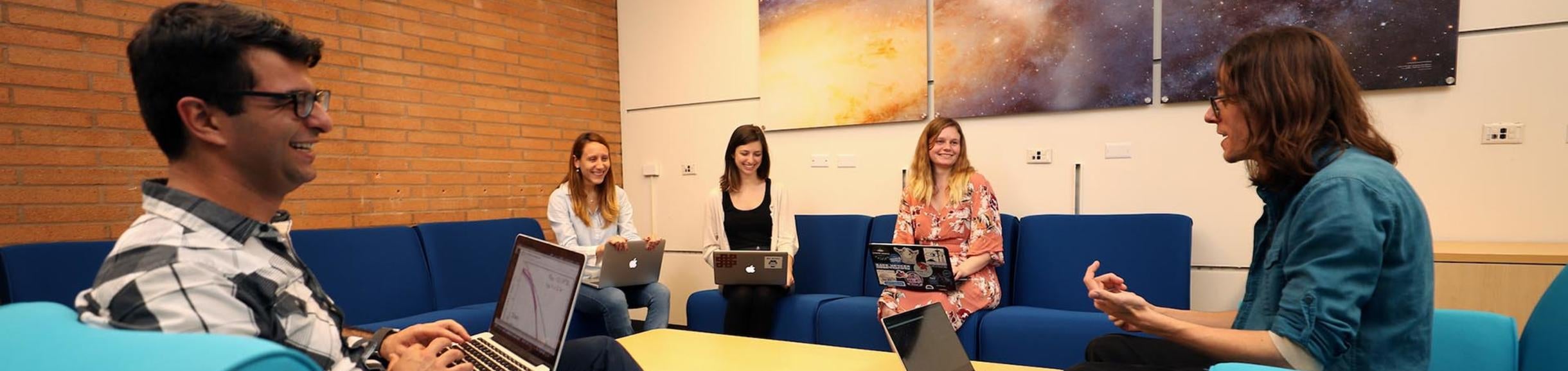 Dr. Laura Sales and grad students